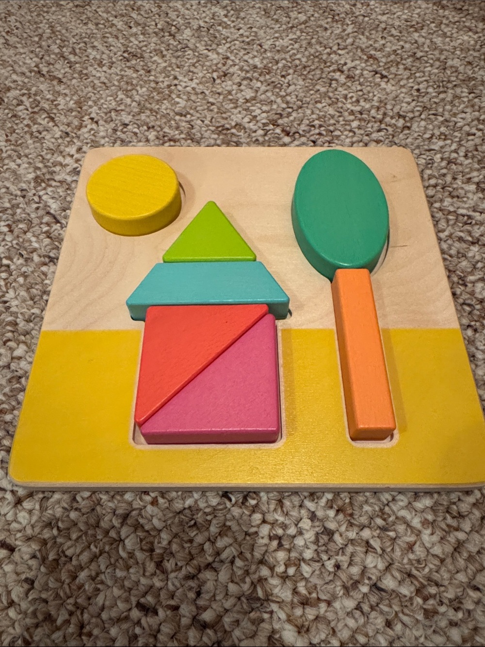 Lovevery double sided wooden puzzle from the Helper play kit